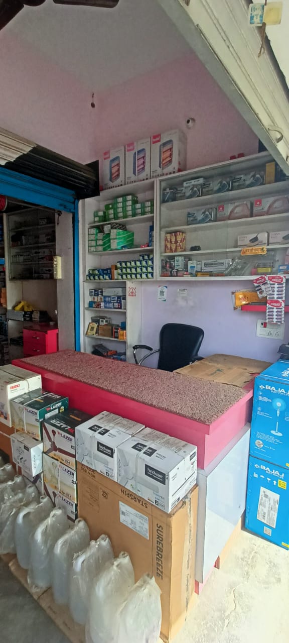 Inside the shop counter with shelves